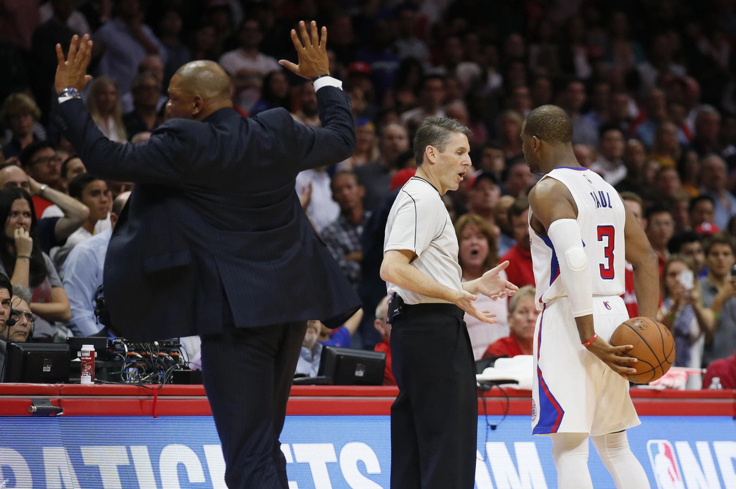 Chris Paul and Clippers Head Coach Doc Rivers Arguing with Referee Scott Foster